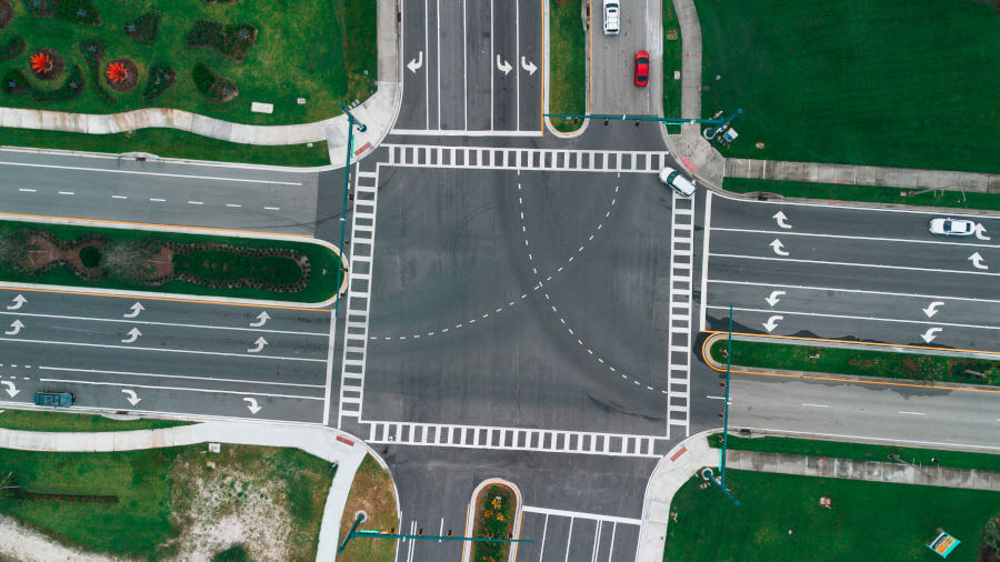 Aerial view of intersection paving by Sunshine Services Unlimited on Crosstown Parkway in Port St. Lucie.